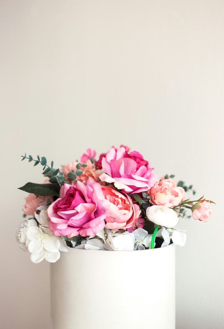 Pink roses in a white vase