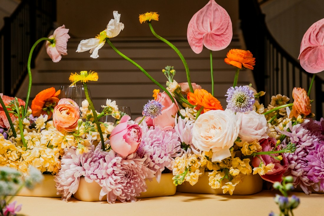 A colorful flower arrangement on a party table