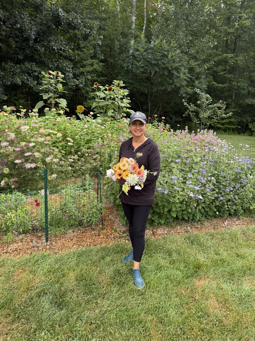 Holding a fresh bouquet in the flower field